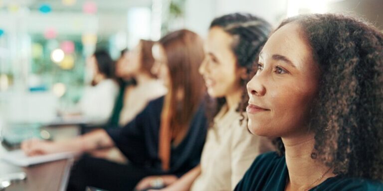 Diverse group of women listening attentively, representing an evidence-first approach to peptide therapy